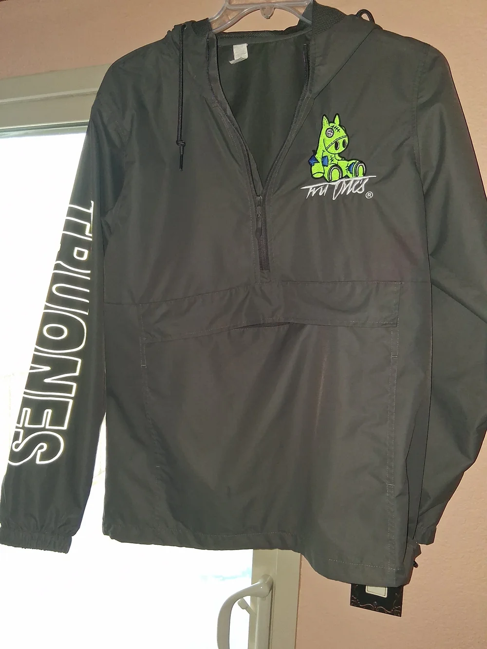 Dark Green Hooded Rain Anorak with Neon Green Character Accent